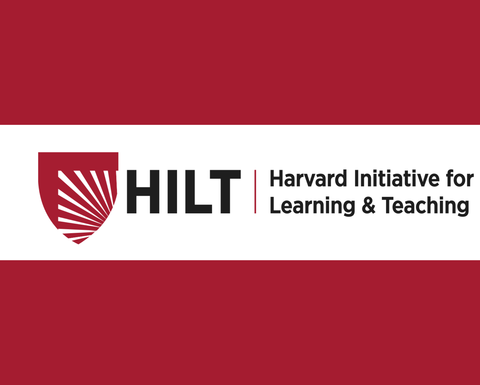 The HILT department's Harvard shield in crimson red and white.